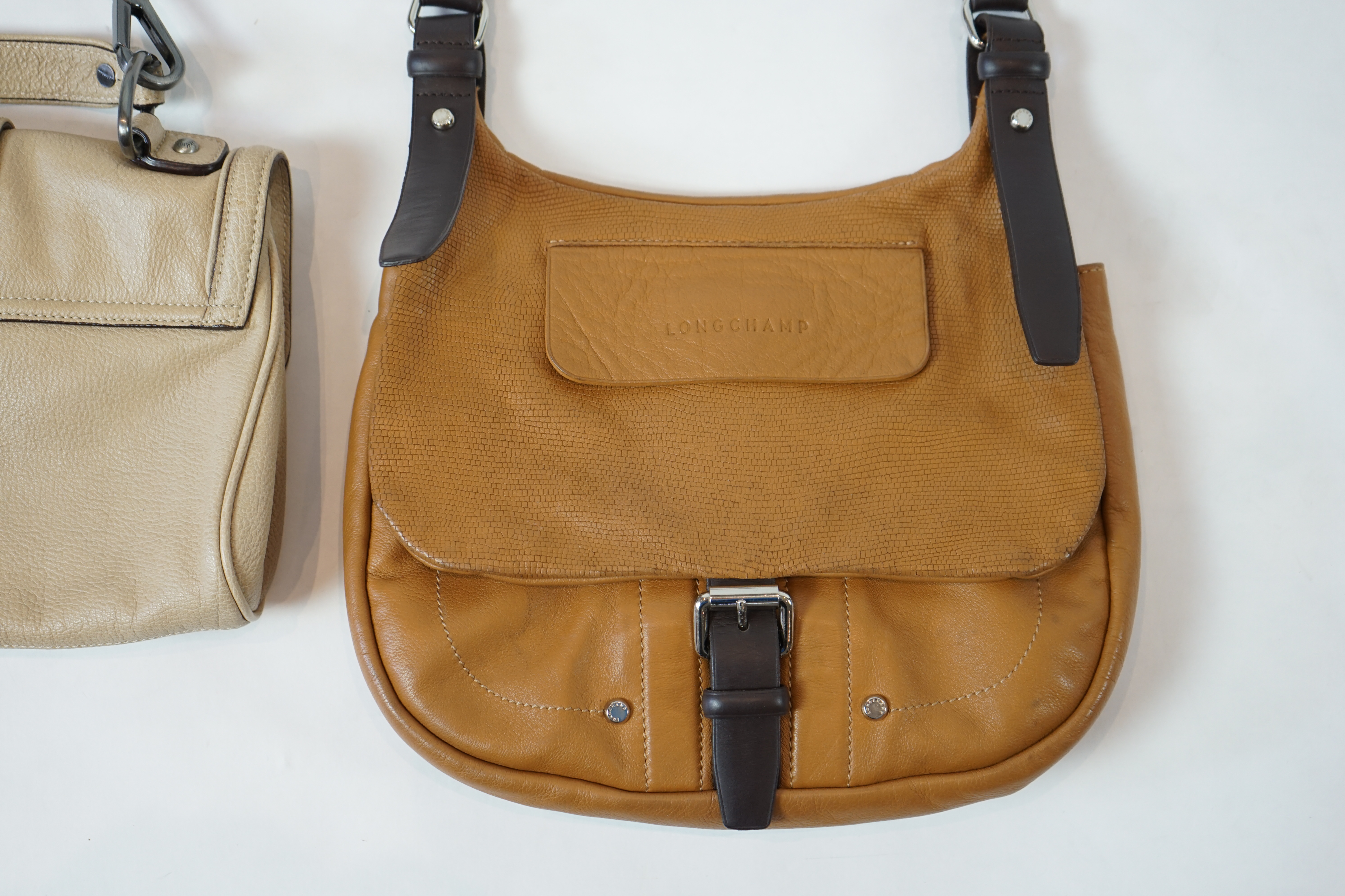 A Max Mara handbag and a Longchamp satchel style bag.